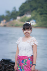 Portrait of a girl standing in water