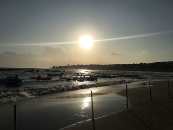 Scenic view of sea against sky at sunset