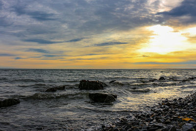 Scenic view of sea against sky during sunset