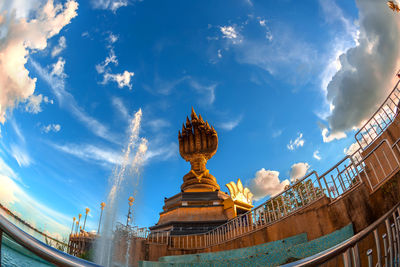 Low angle view of statue against building