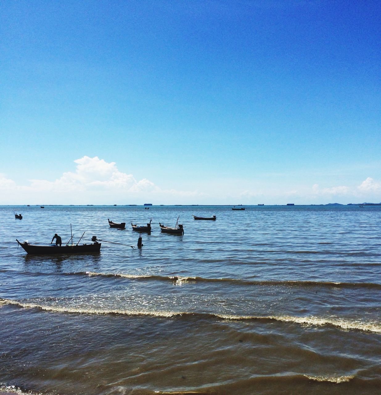 sea, water, nautical vessel, transportation, mode of transport, boat, horizon over water, beach, sky, scenics, tranquility, nature, tranquil scene, beauty in nature, clear sky, moored, blue, shore, copy space, travel