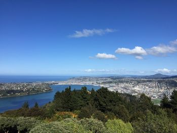 Scenic view of sea against blue sky