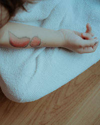 Low section of person lying on floor