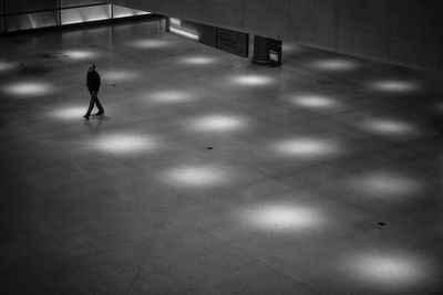 Man walking in corridor