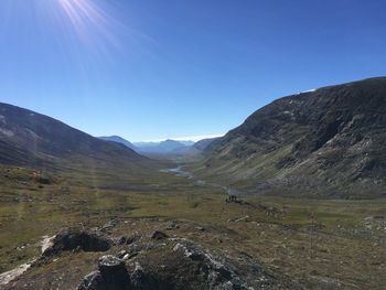 Scenic view of mountains against clear sky