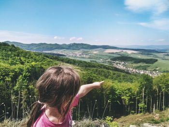 High angle view of girl looking at landscape