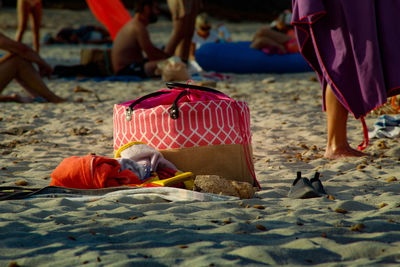Low section of people on beach