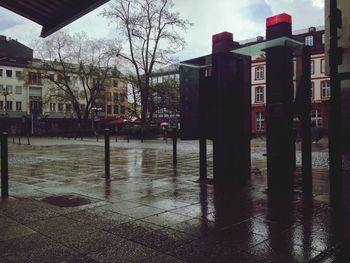Buildings in city against sky