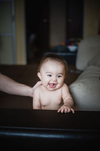 Portrait of cute baby girl at home