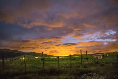 Scenic view of dramatic sky during sunset