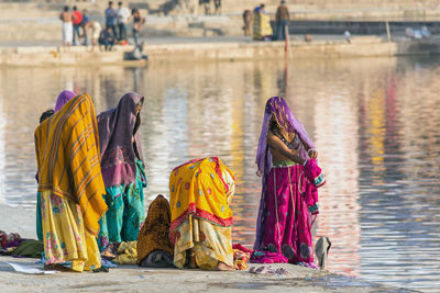 Women in sari by pushkar lake