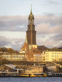 View of buildings against sky in city