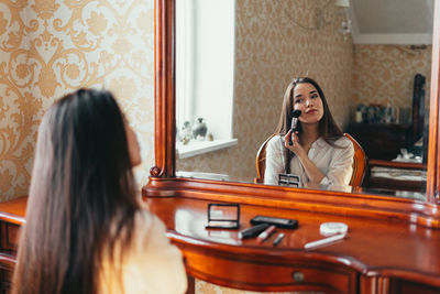 Young woman playing guitar