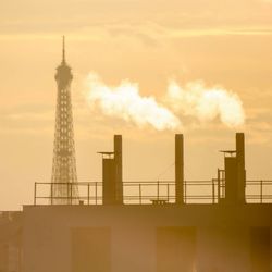Silhouette of tower against sky at sunset