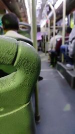 Close-up of green leaf in car