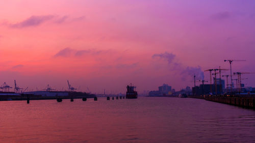 Scenic view of sea against sky at sunset