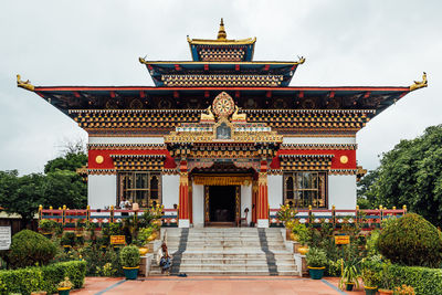 View of temple against building