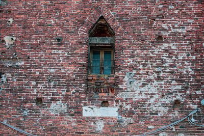 Low angle view of weathered building