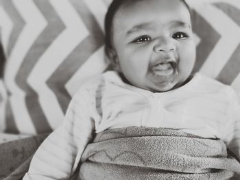 Portrait of cute baby girl at home