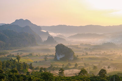 Panoramic view of landscape against sky during sunset