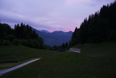 Scenic view of landscape against sky during sunset