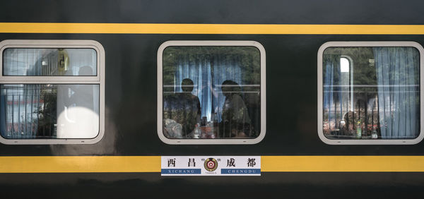 Reflection of train on window