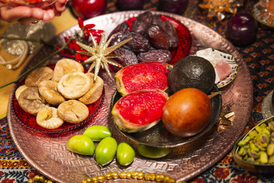 Close-up of fruits in plate on table