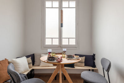 Empty chairs and table at home