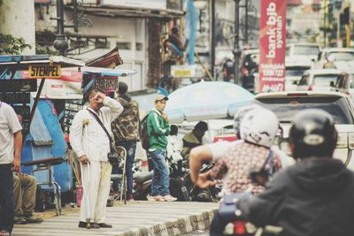 People on street in city