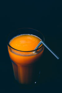 Close-up of drink against black background