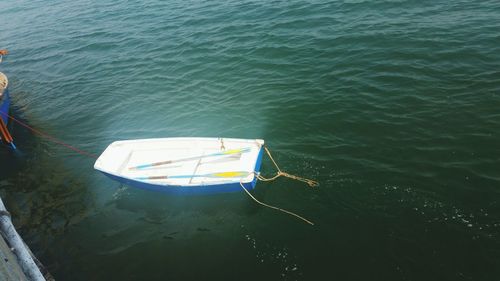 High angle view of boat moored on sea