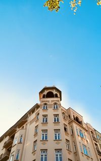 Low angle view of building against blue sky