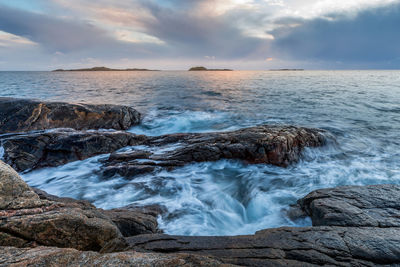 Scenic view of sea against sky during sunset