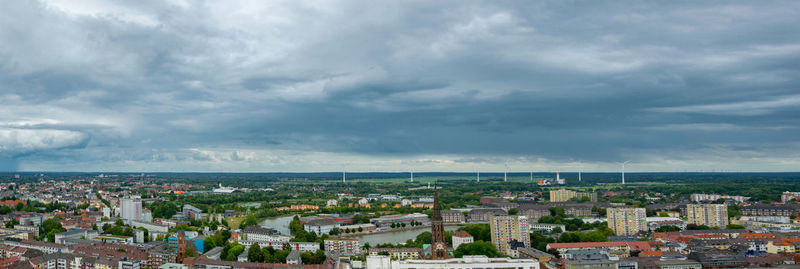 High angle shot of townscape against sky