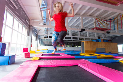 Full length of woman jumping