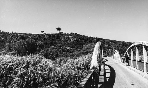 Panoramic view of bridge against clear sky