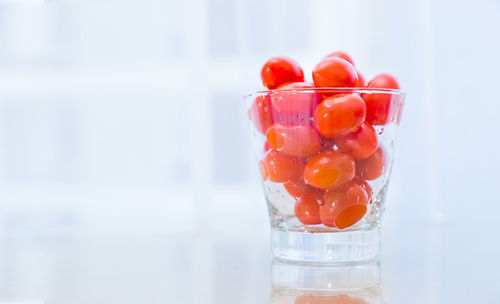 Close-up of fruits in glass on table