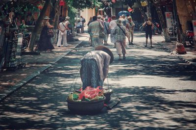 People on street in city