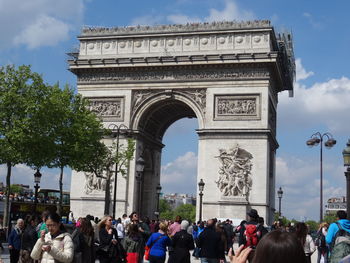 Low angle view of historical building against cloudy sky