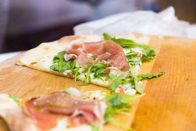 Close-up of food served on cutting board