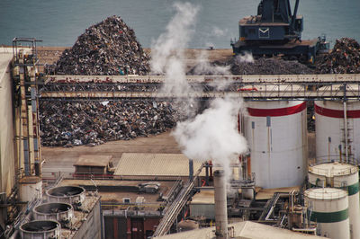 High angle view of smoke emitting from factory