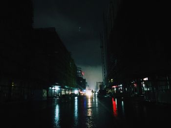 Illuminated buildings in city at night