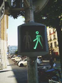 Walk signal by footpath in city