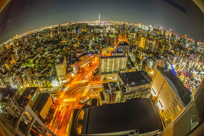 High angle view of illuminated buildings at night