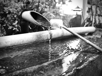 Water pouring from shishi-odoshi