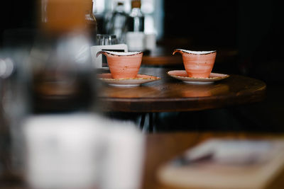 Coffee cup on table in cafe