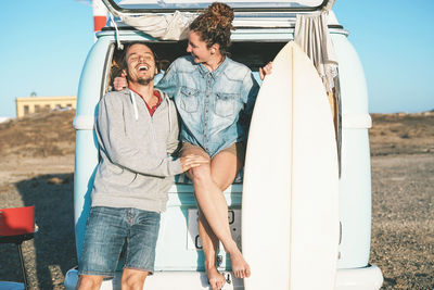 Young couple standing outdoors