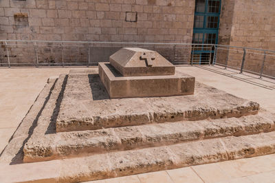 High angle view of steps and brick wall of building