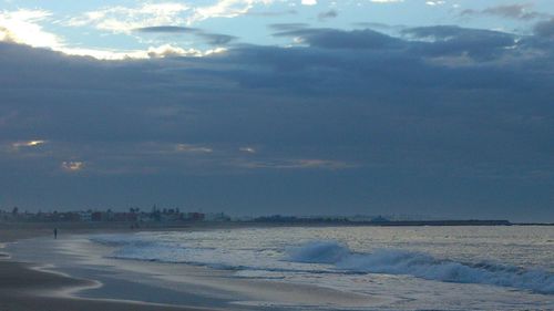 Scenic view of sea against sky during winter