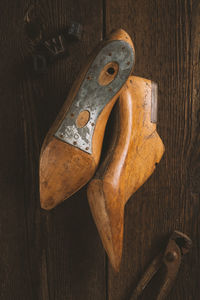 Directly above shot of wooden shoe on floor